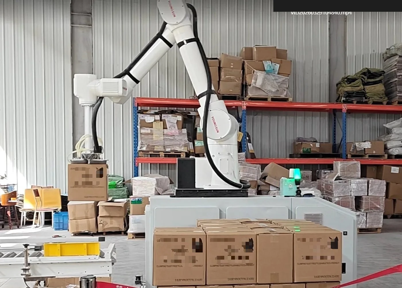 Robotic arm for automated palletizing
